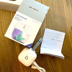 Munchkin portable UV pacifier sterilizer. Used 1-2 times.